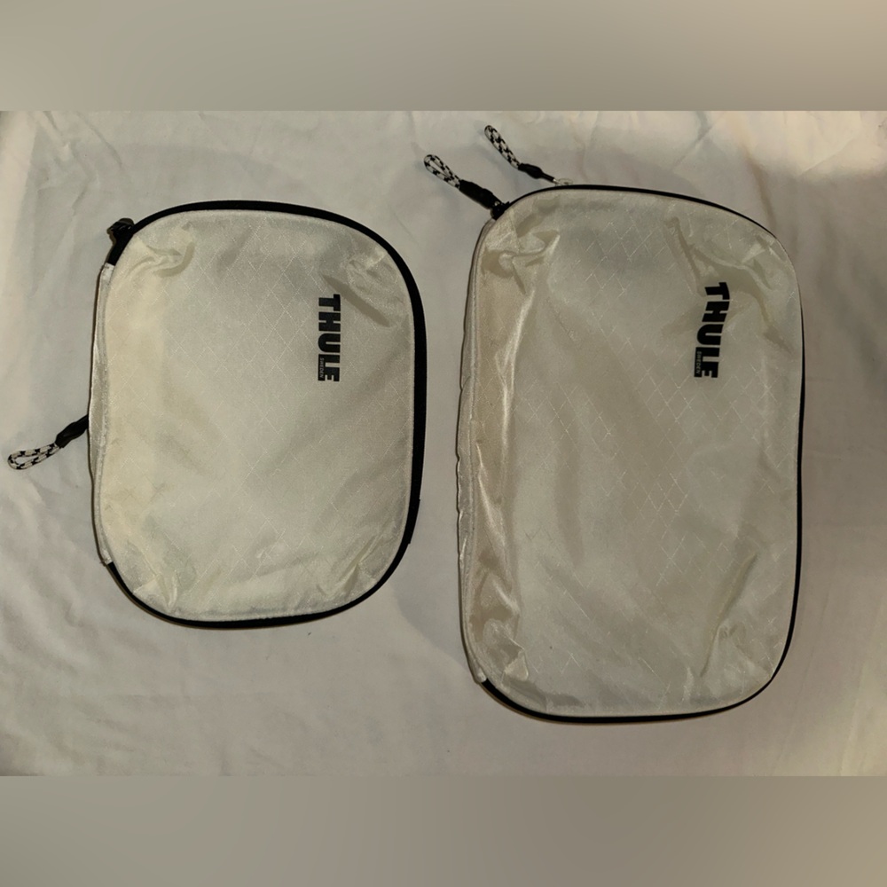 Thule White and Black Travel Packing Cube Set (2) small and medium size.